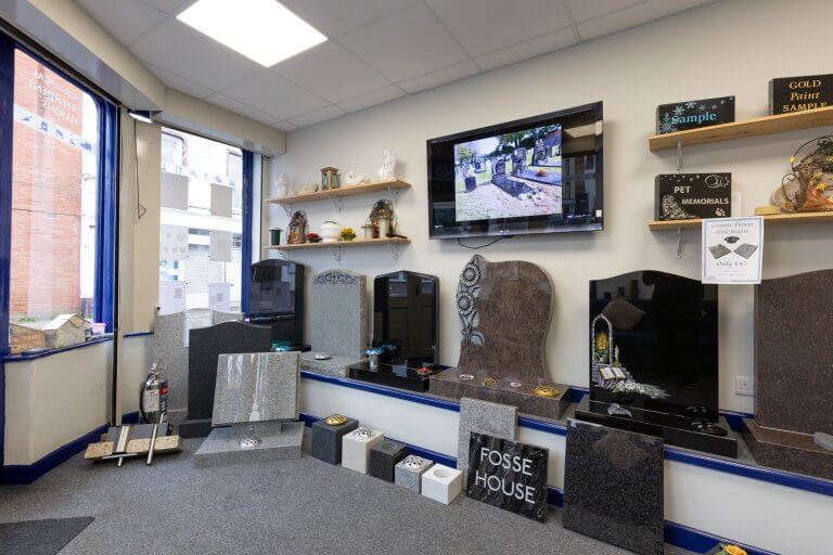 Inside Fine Memorials Bridgwater showroom on St Mary Street – selection of cremation memorials and plaques