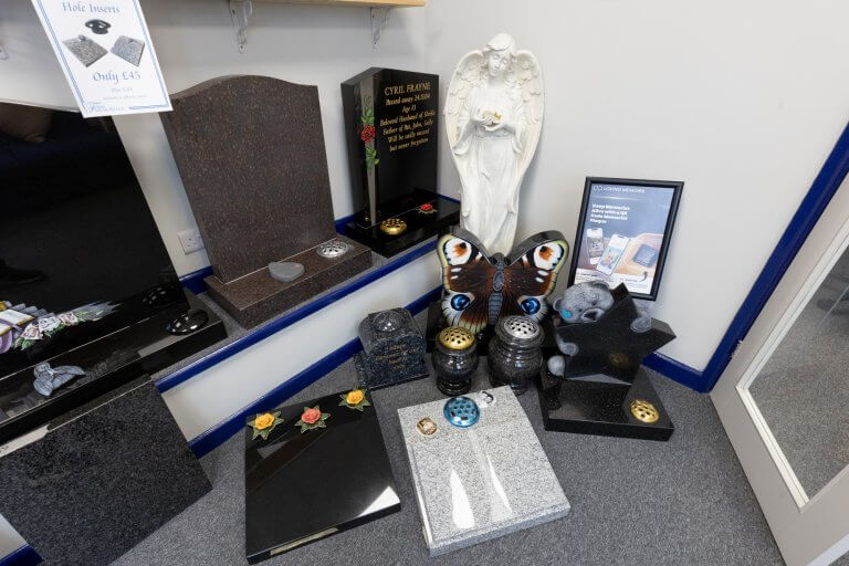 Inside Fine Memorials Bridgwater showroom on St Mary Street – selection of cremation memorials and plaques