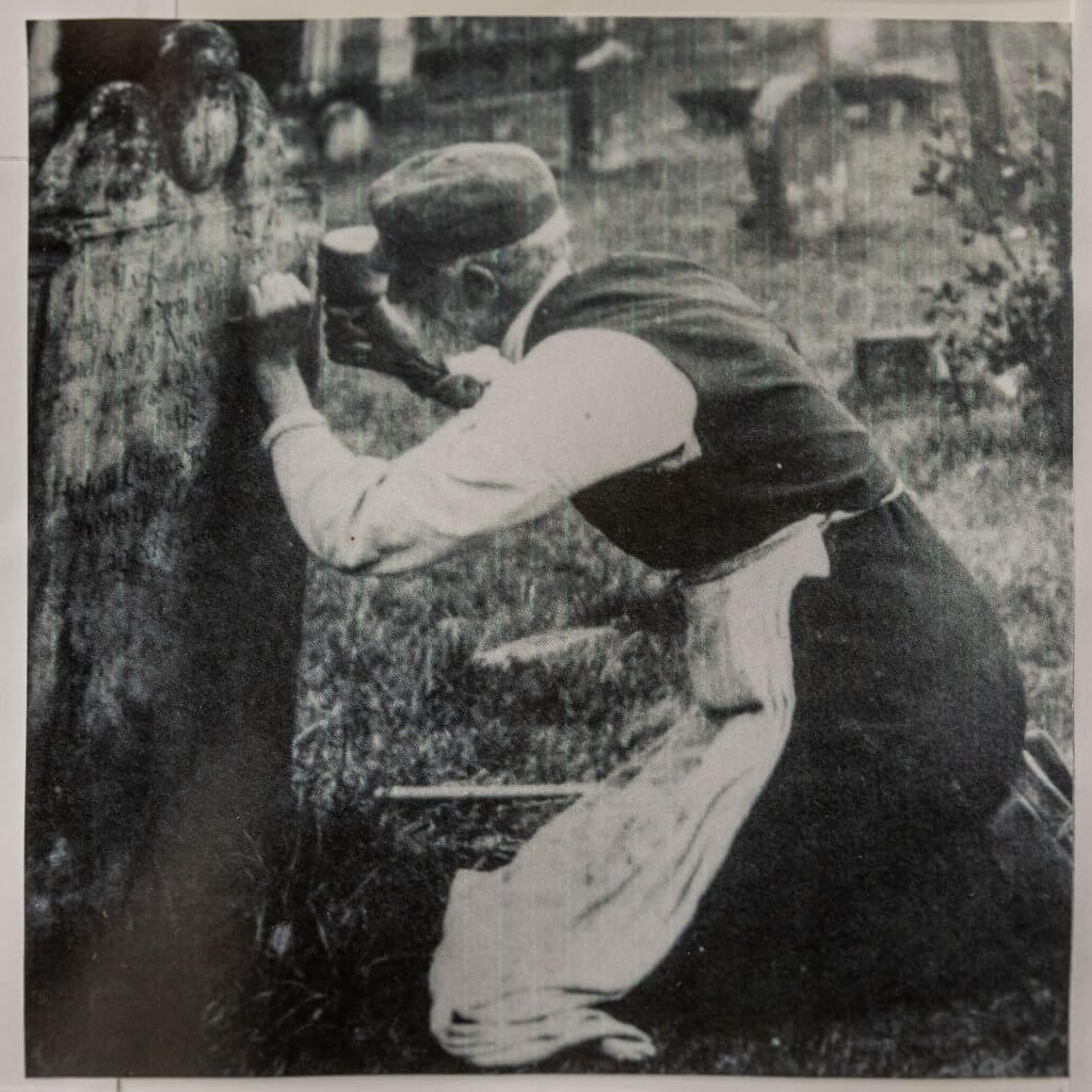 Archive Photo of Appleby & Childs employee hand carving on location
